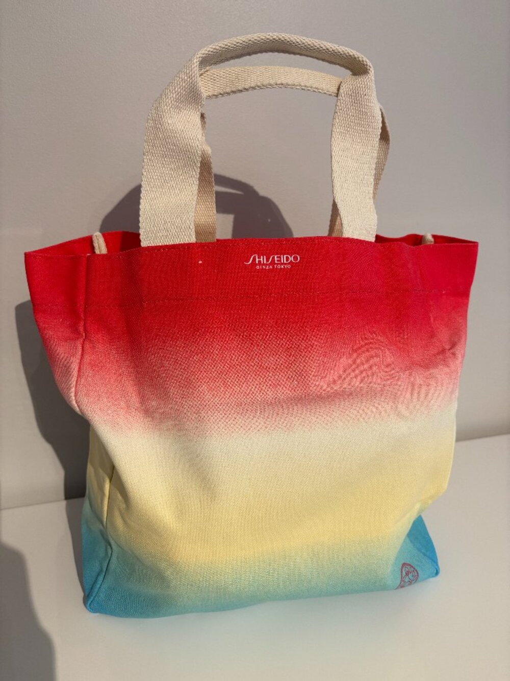 New Shiseido Red, White, Yellow & Blue Ombre Canvas Shoulder Tote